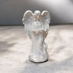 Elegant White Angel Figurine Playing Accordian